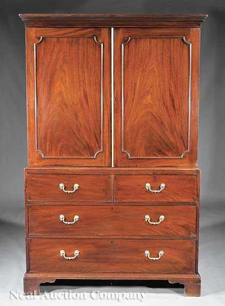 Appraisal: A George III Mahogany Linen Press c stepped cornice pair