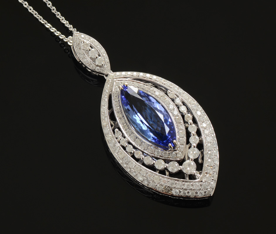 Appraisal: TANZANITE AND DIAMOND PENDANT NECKLACE K white gold pendant enhancer