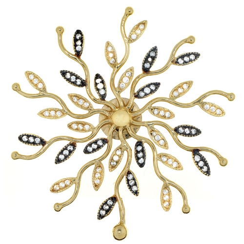 Appraisal: A diamond pendant of radiating leaf design in gold mm