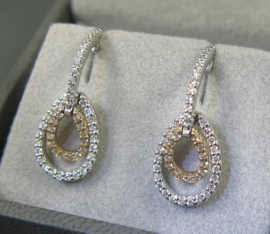 Appraisal: PAIR OF DIAMOND EARRINGS each k yellow and white gold