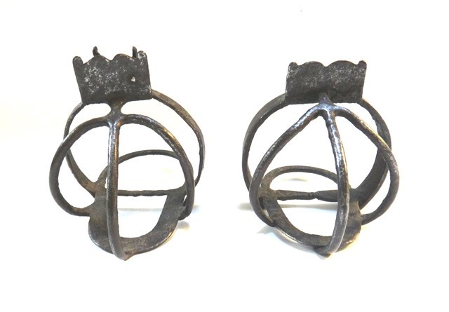 Appraisal: A pair of German steel horse stirrups probably th century