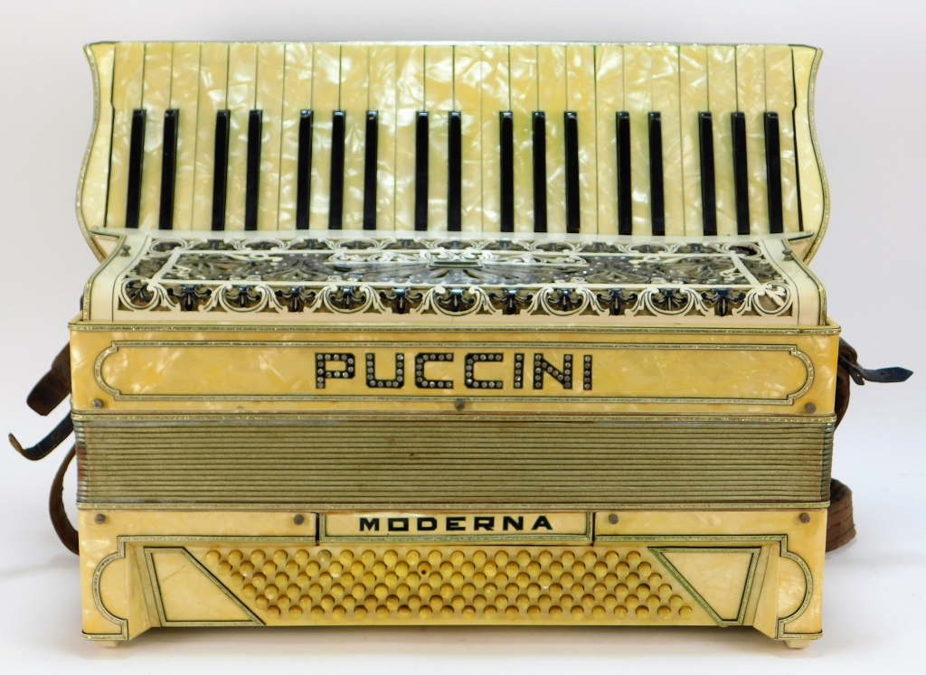 Appraisal: ITALIAN PUCCINI MODERNA ACCORDION WITH CASE Italy th CenturyCreamy mother