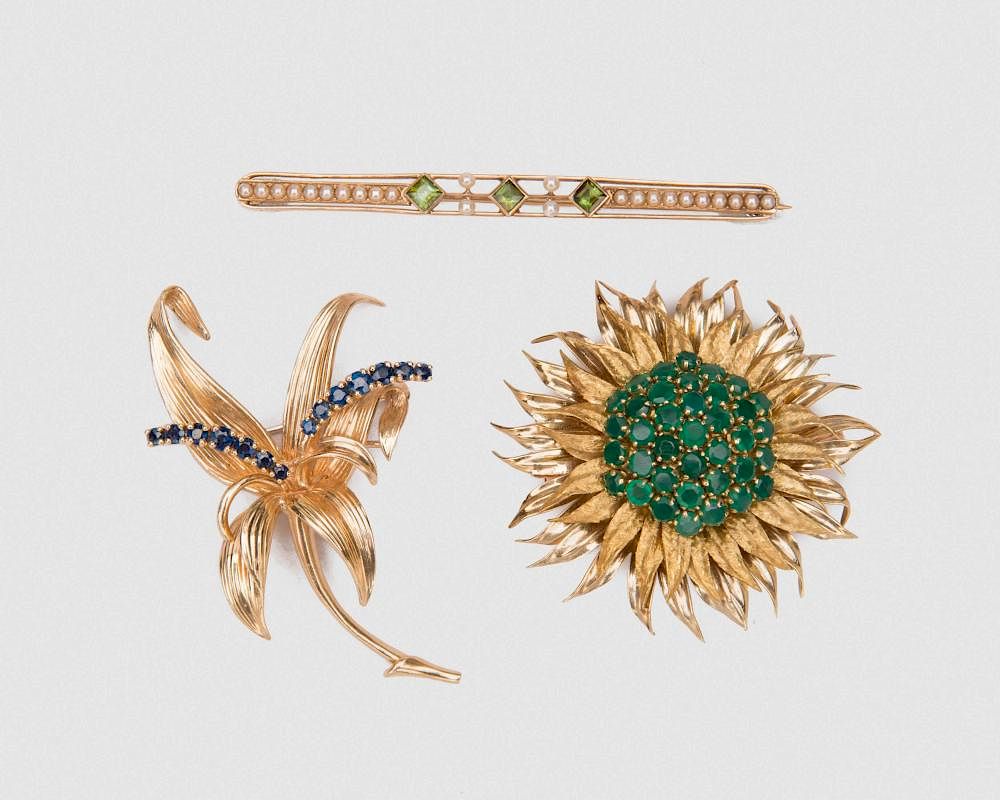 Appraisal: Three K Yellow Gold and Gemset Brooches Three K Yellow