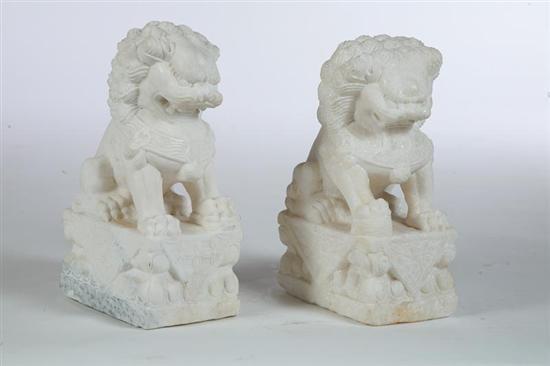 Appraisal: PAIR OF CHI LINH LIONS Chinese th century marble White