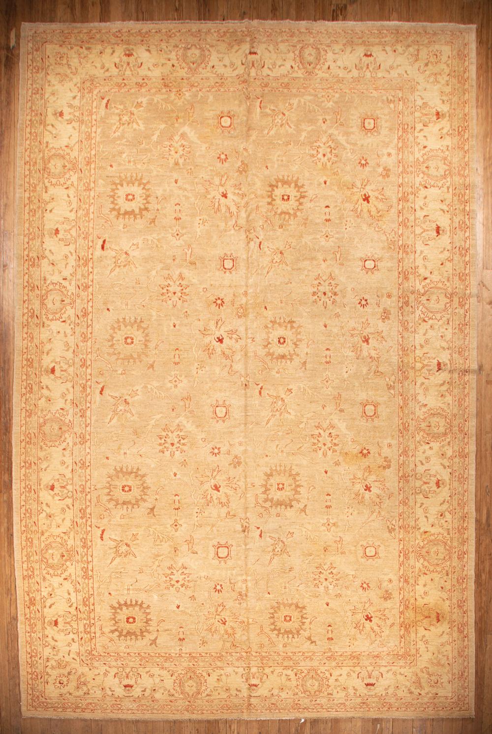 Appraisal: Persian Sarouk Carpet cream ground foliate design in red and