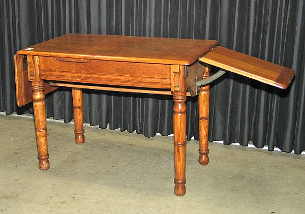 Appraisal: An American oak physician's examining table late th century height