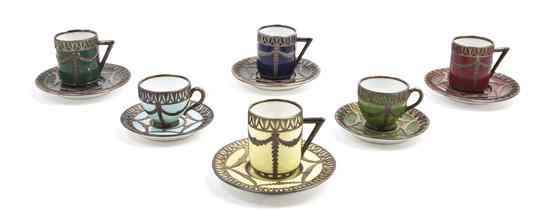 Appraisal: A German Cased Set of Silver Overlay Teacups and Saucers