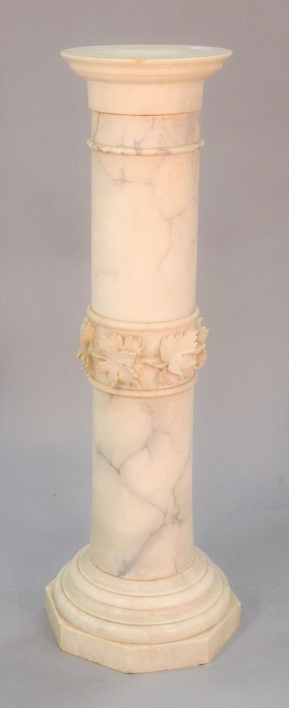 Appraisal: White marble pedestal carved floral details to the base in