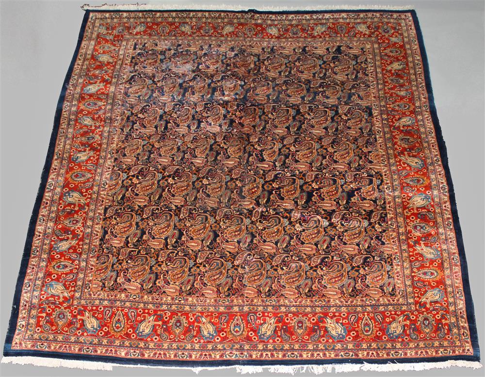 Appraisal: LARGE PERSIAN SAROUK WOOL RUG all over paisley botehs on