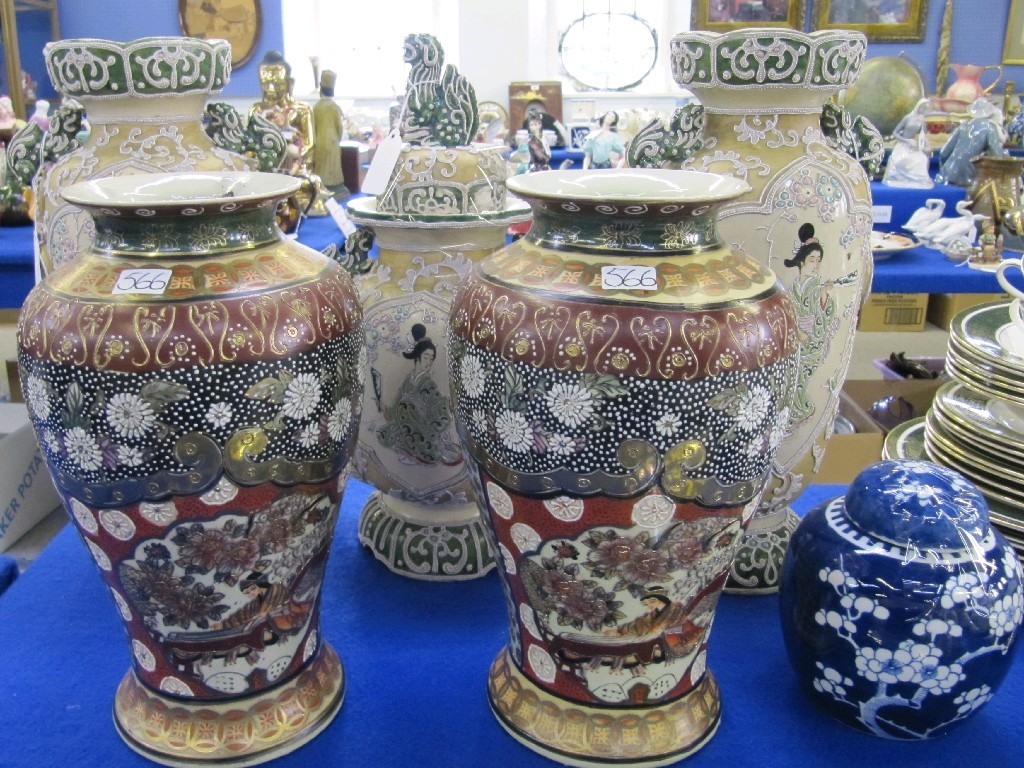 Appraisal: Lot comprising oriental garniture pair of vases and a prunus