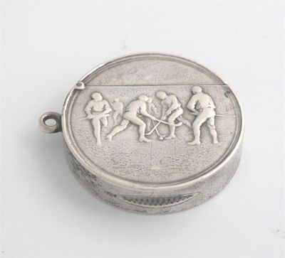 Appraisal: An Edwardian circular vesta case the front depicting men playing