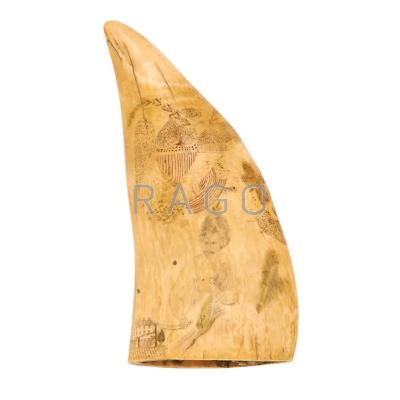 Appraisal: SCRIMSHAW WHALE S TOOTH Decorated with an eagle and dove