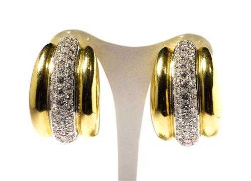 Appraisal: GOLD AND BRILLIANT-CUT DIAMOND CLIP EARRINGS Yellow and white gold