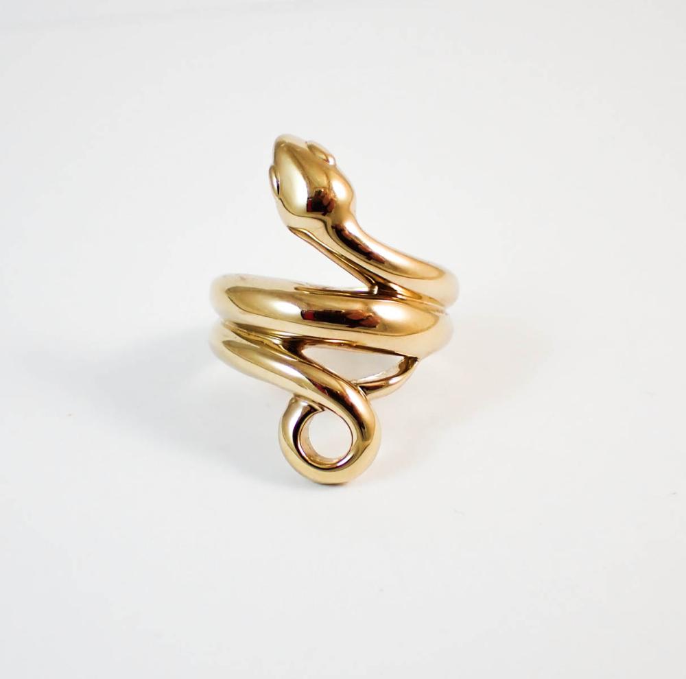 Appraisal: FOURTEEN KARAT YELLOW GOLD SNAKE RING weighing grams and stamped