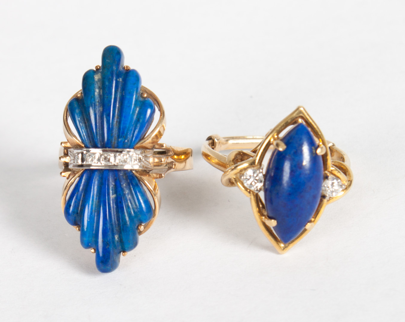 Appraisal: Two gold lapis lazuli and diamond rings K gold marquis-shaped