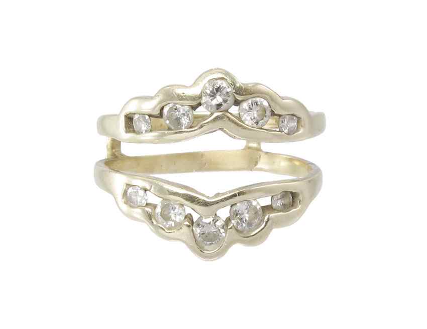 Appraisal: DIAMOND INSERT RING JACKET K yellow gold insert ring contains