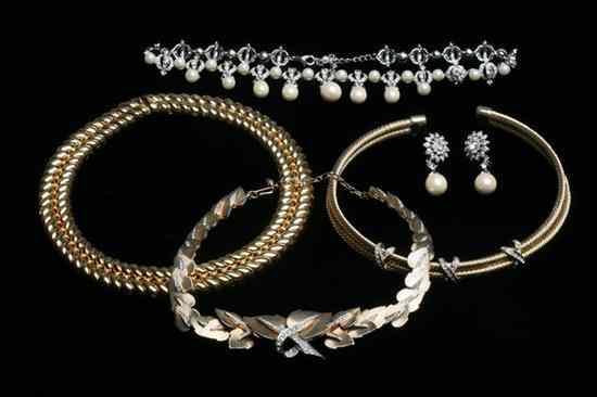 Appraisal: FOUR COSTUME JEWELRY NECKLACES Signed Boucher flexible-link leaf design choker