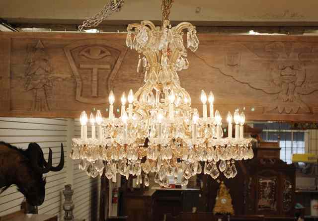 Appraisal: LARGE LOUIS XV STYLE TWENTY-FOUR LIGHT CRYSTAL CHANDELIER having eight