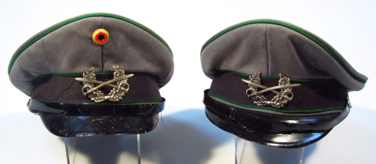 Appraisal: Two German officer's caps with green trim one with A