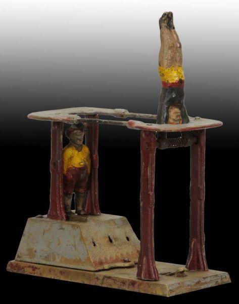 Appraisal: Cast Iron Acrobats Mechanical Bank Description Working Vintage Repainted No