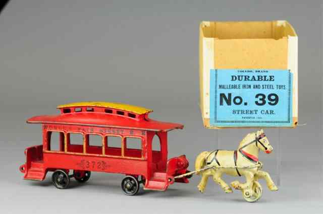 Appraisal: WILKENS ''WORLDS FAIR'' HORSEDRAWN TROLLEY WITH BOX Cast iron toy