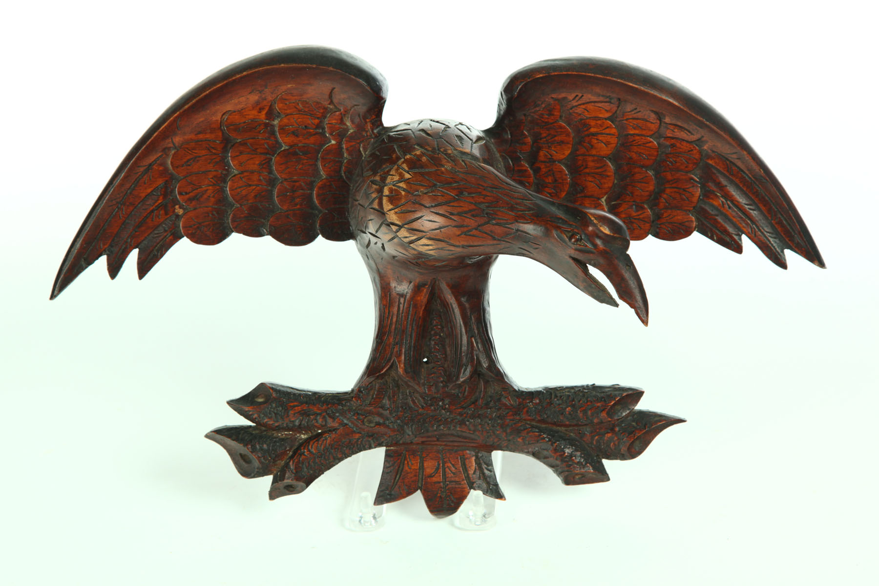 Appraisal: CARVED EAGLE American early th century mahogany Crest from a