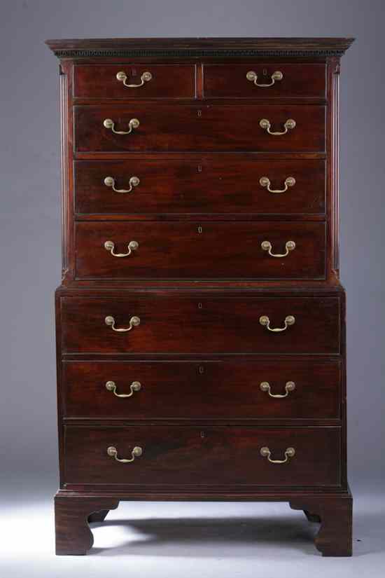 Appraisal: GEORGIAN MAHOGANY CHEST-ON-CHEST th century Upper section projected molded cornice