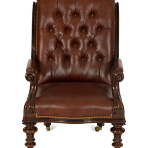 Appraisal: A Regency Style Leather Upholstered Mahogany Open Armchair th Century