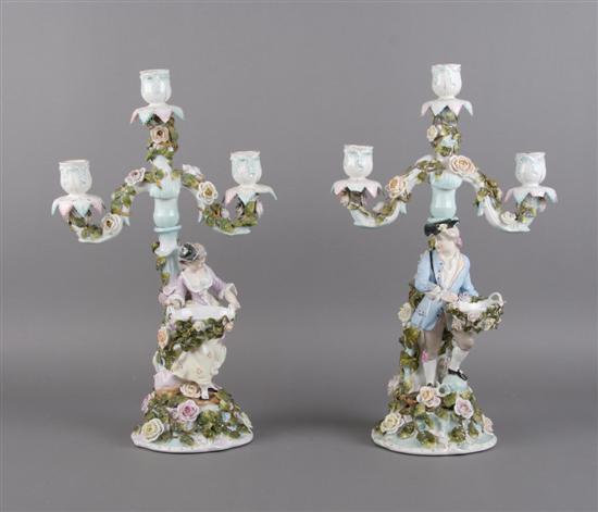 Appraisal: A Pair of German Porcelain Three-Light Candelabra Height x width