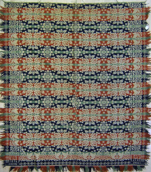 Appraisal: Red blue and green jacquard coverlet inscribed Henry Brehm Womelsdorf