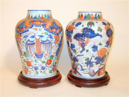 Appraisal: Pair of Chinese wucai jars transitional period th century Short