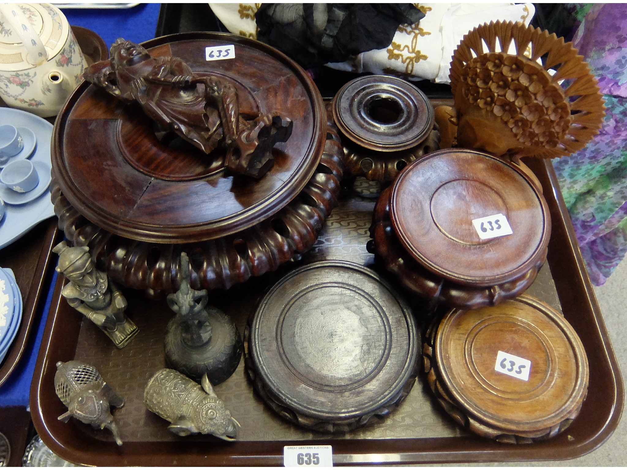 Appraisal: Assorted Chinese wooden stands and metal figures