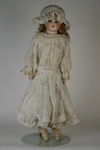 Appraisal: DOLL - bisque shoulder head illegibly marked with blue glass