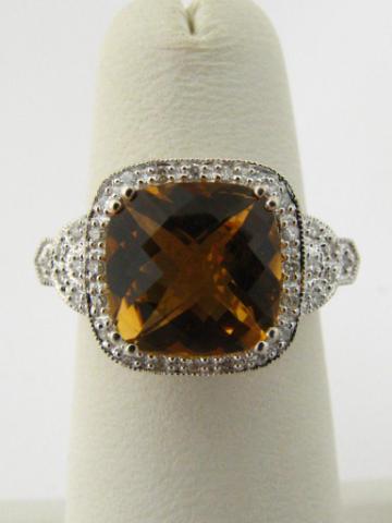 Appraisal: k white gold citrine and diamond ring citrine surrounded by