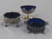 Appraisal: Three various silver open condiment pots each with blue glass