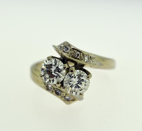 Appraisal: k white gold and two diamond bypass ring k white