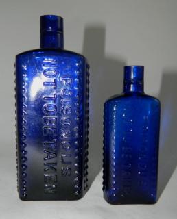 Appraisal: Poison cobalt rectangle bottles Poison- cobalt rectangle embossed with three