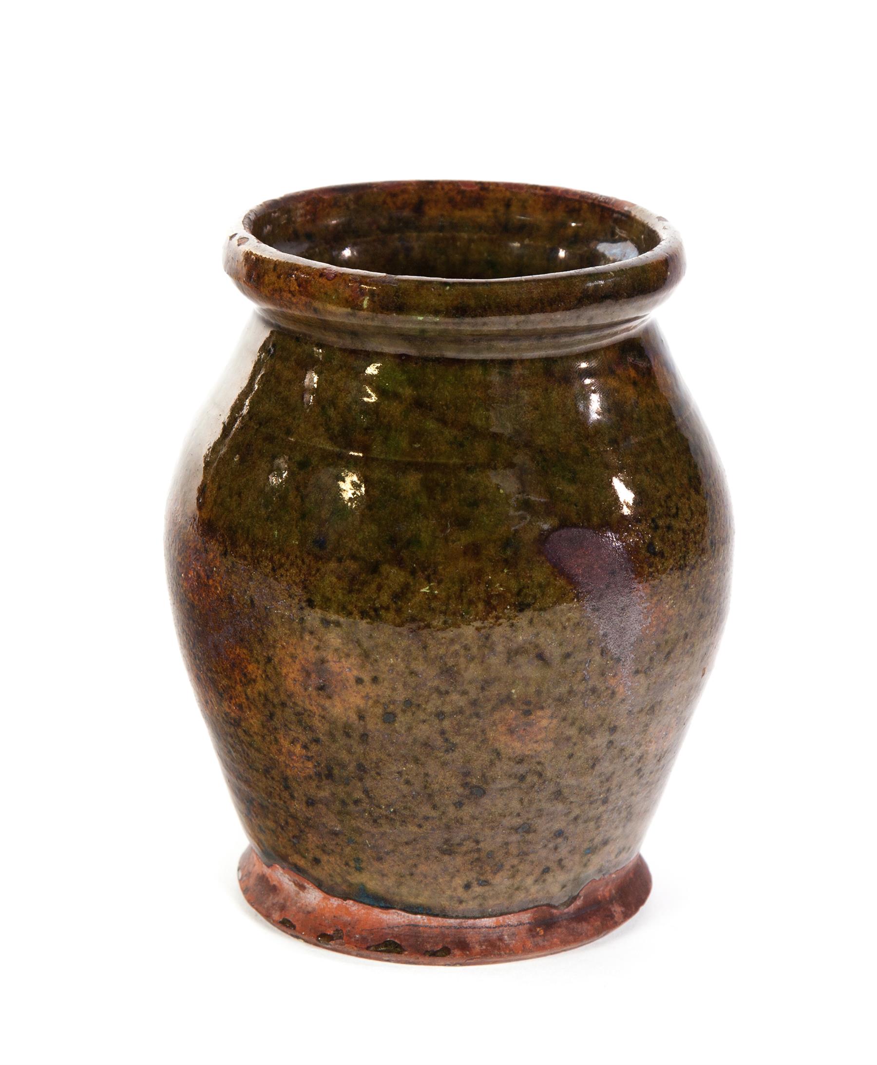 Appraisal: AMERICAN REDWARE JAR Mid th century Good mottled green glaze