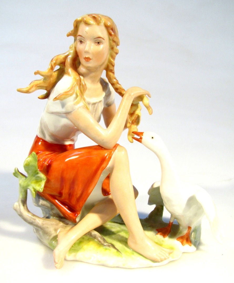 Appraisal: A thC Kaiser porcelain figure of a girl seated aside