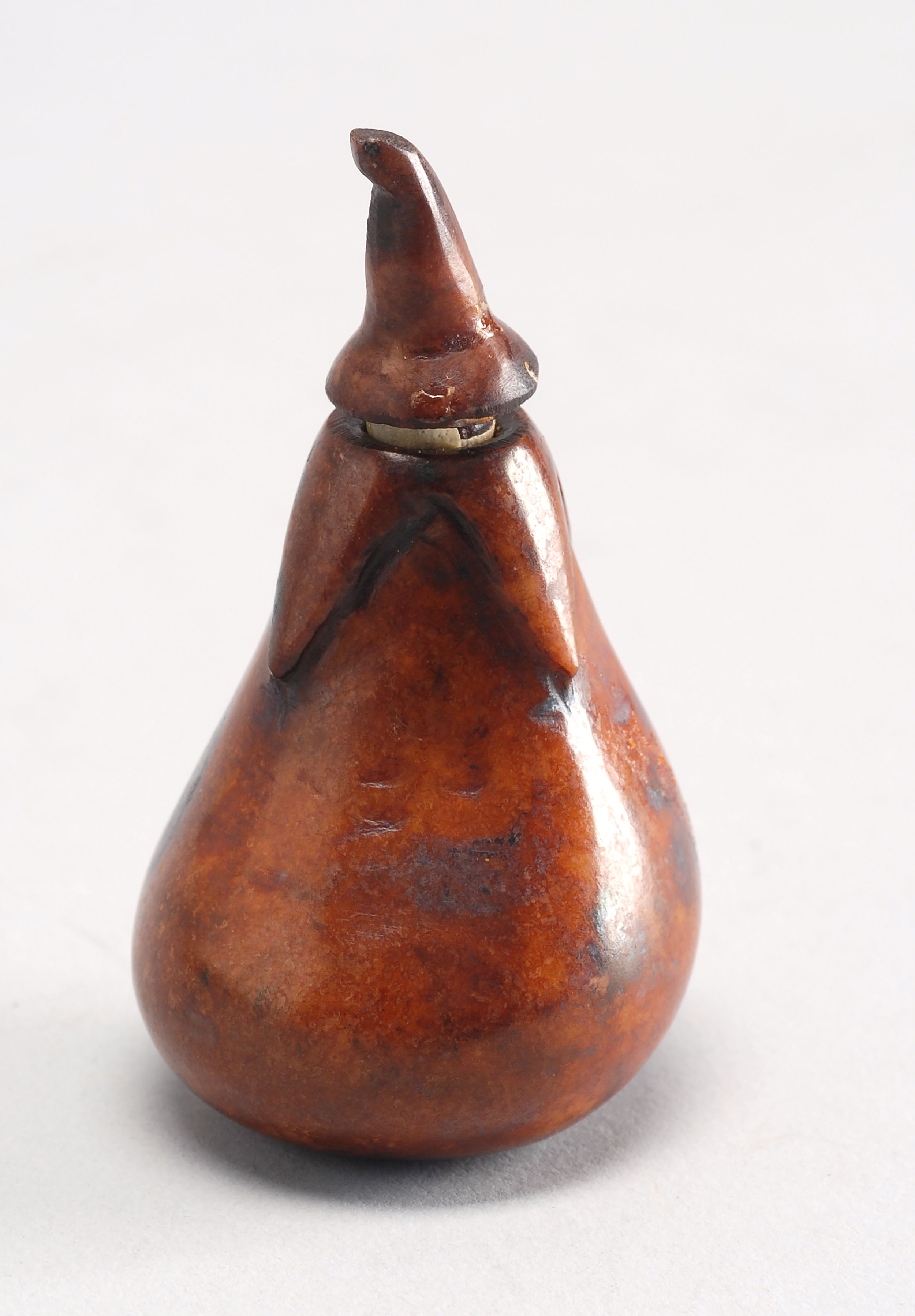 Appraisal: SOAPSTONE SNUFF BOTTLE Early th CenturyIn eggplant form with conforming