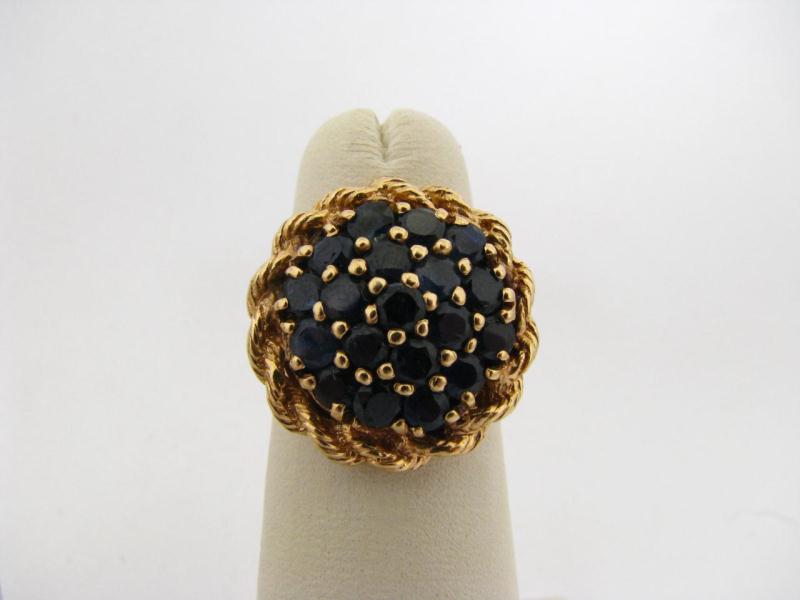 Appraisal: A K Yellow Gold Rope Twist Motif Sapphire Lady's Ring