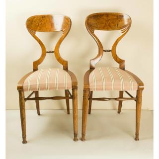 Appraisal: Pair of Biedermeier Style Chairs Pair of Biedermeier style fruitwood