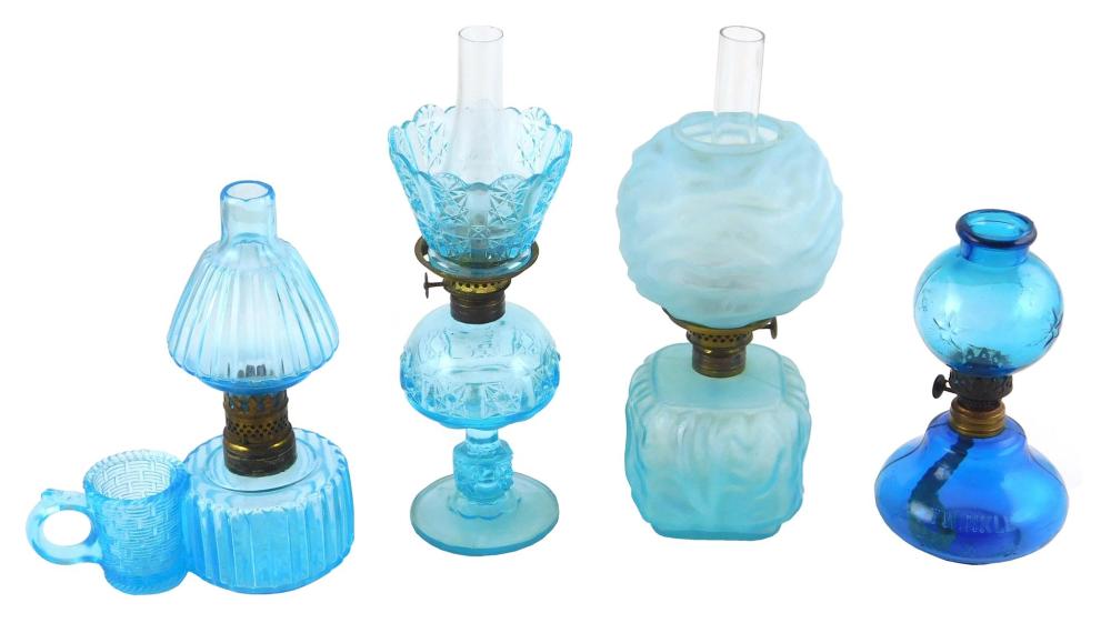 Appraisal: Miniature oil lamps four pieces all with blue shades and