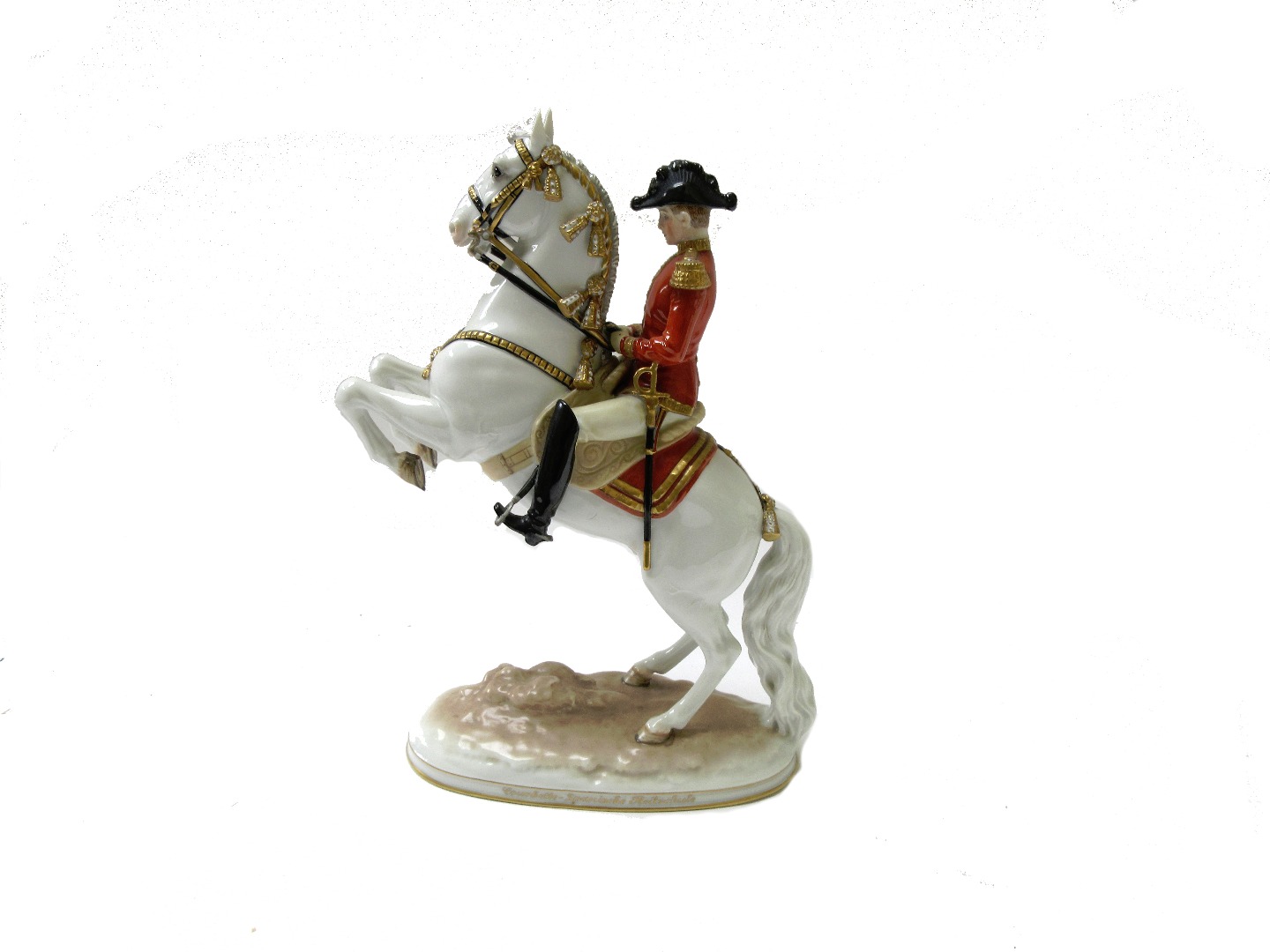 Appraisal: A Vienna porcelain figure of a cavalry officer on a