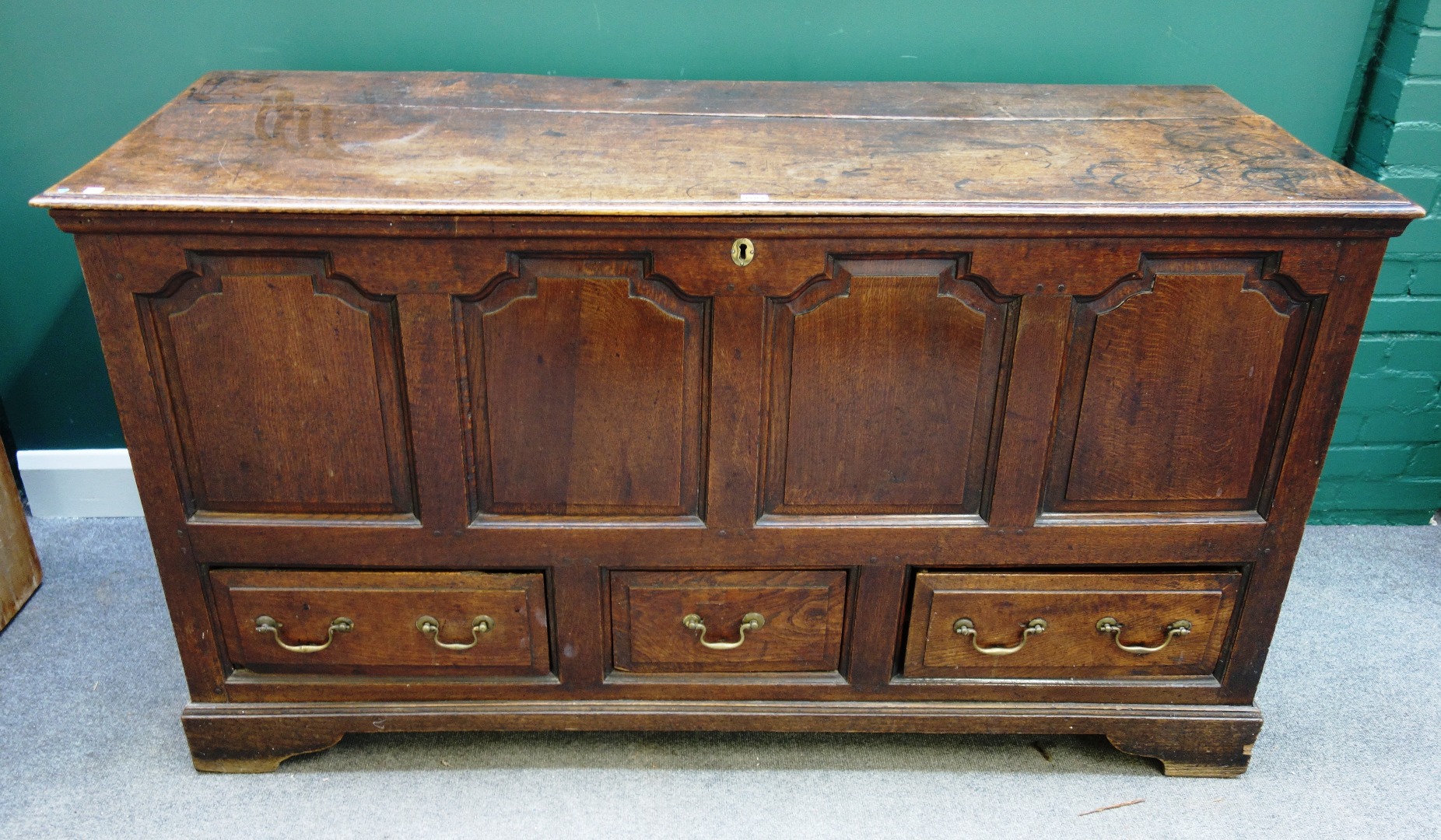 Appraisal: A mid th century oak mule chest with four panel