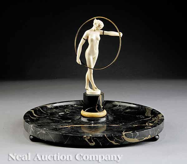 Appraisal: A French Carved Ivory Figure of a Hoop Dancer after