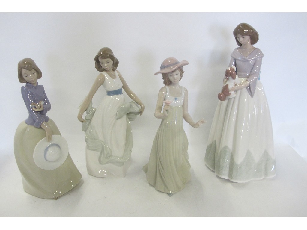 Appraisal: Four Nao figures of girls