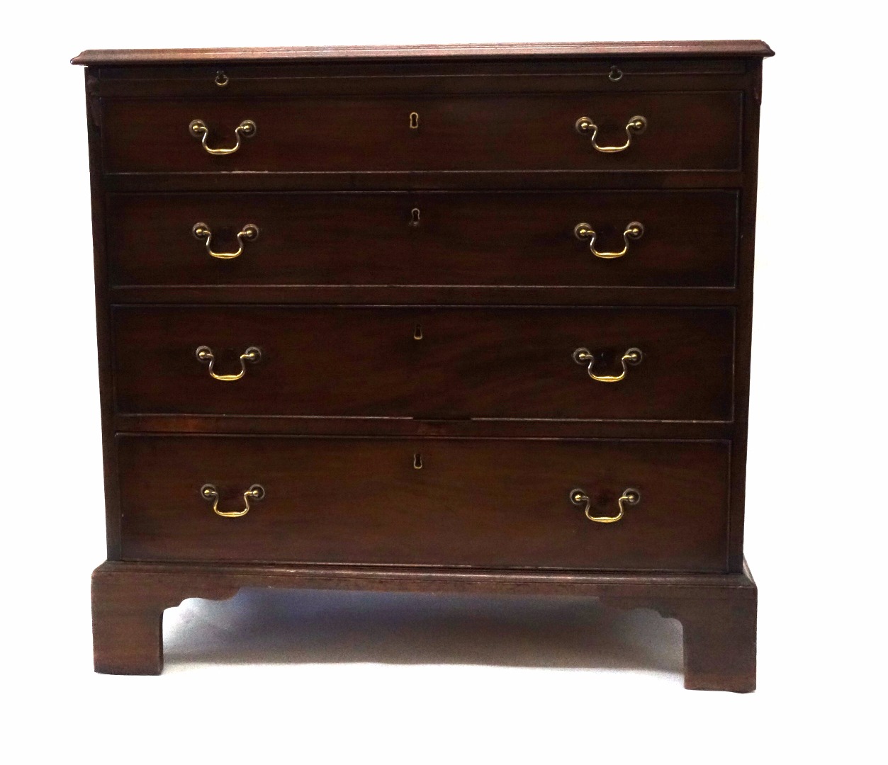 Appraisal: A George III mahogany chest the moulded rectangular top above