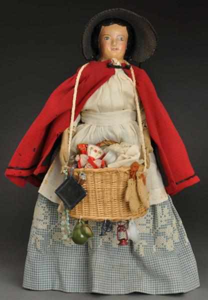 Appraisal: Unusual Leather Peddler Doll American Darrow leather shoulder head with