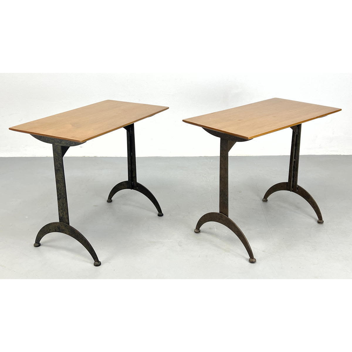 Appraisal: Pr Tall Wood Top Side Tables Iron bases with arch